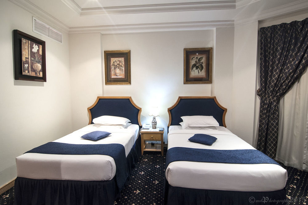 Cayam Hotel Доха Екстериор снимка