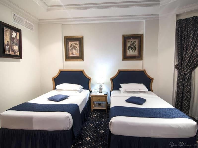 Cayam Hotel Доха Екстериор снимка